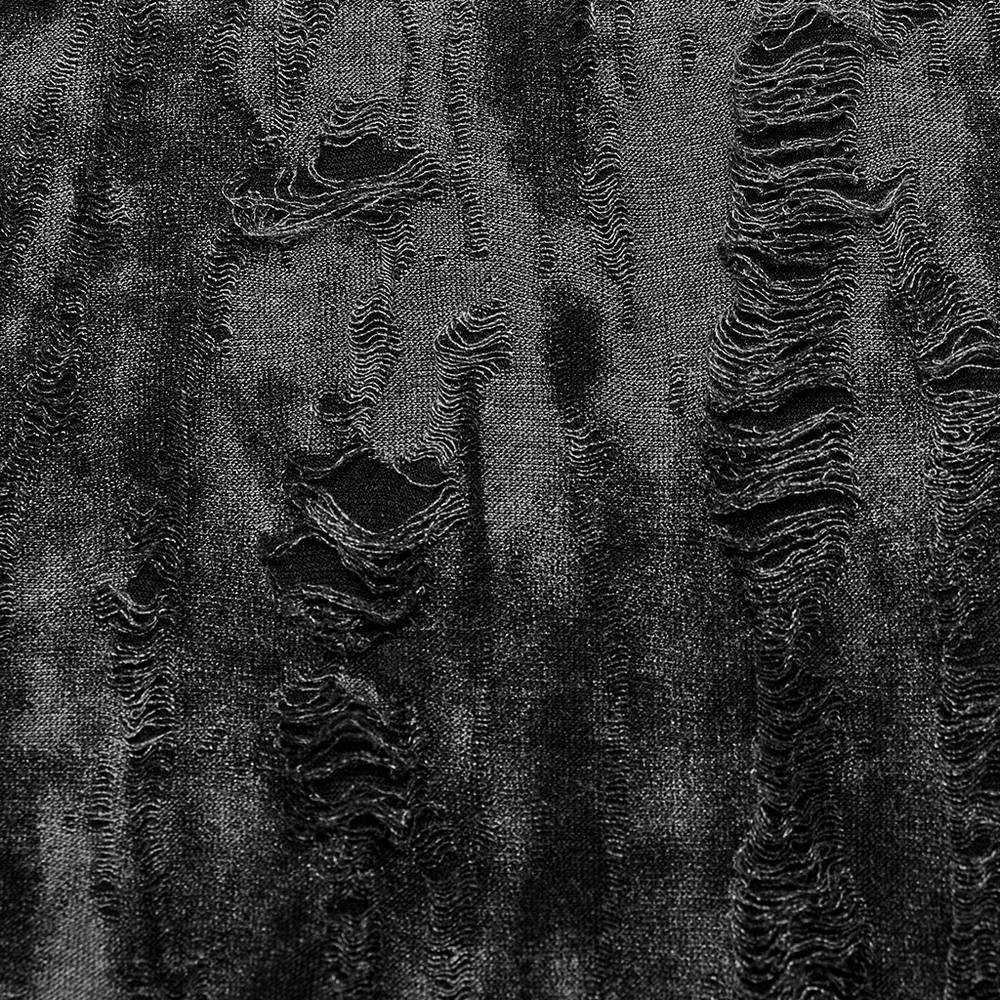 Close-up of tattered black fabric showcasing distressed texture ideal for gothic styles.