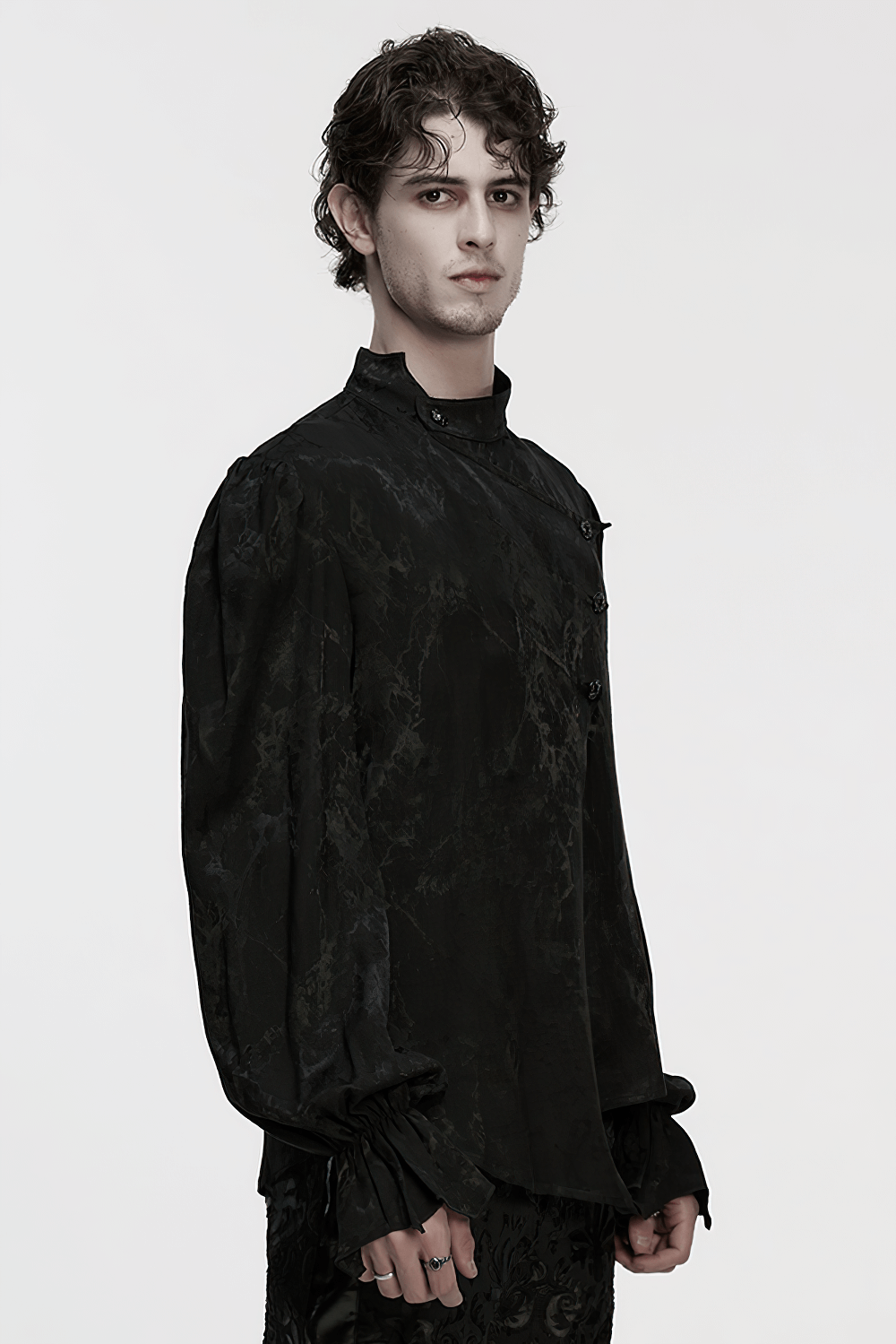 Gothic Textured Long Sleeve Shirt with Irregular Placket model showcasing its dramatic sleeves and mottled texture.