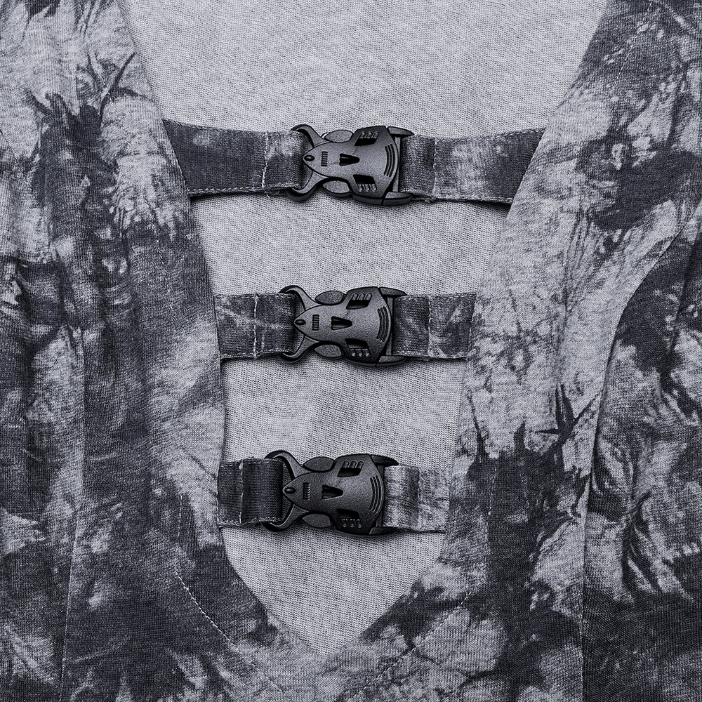 Close-up of gothic tie-dye dress showcasing sleek front buckle details for a cyber chic look.