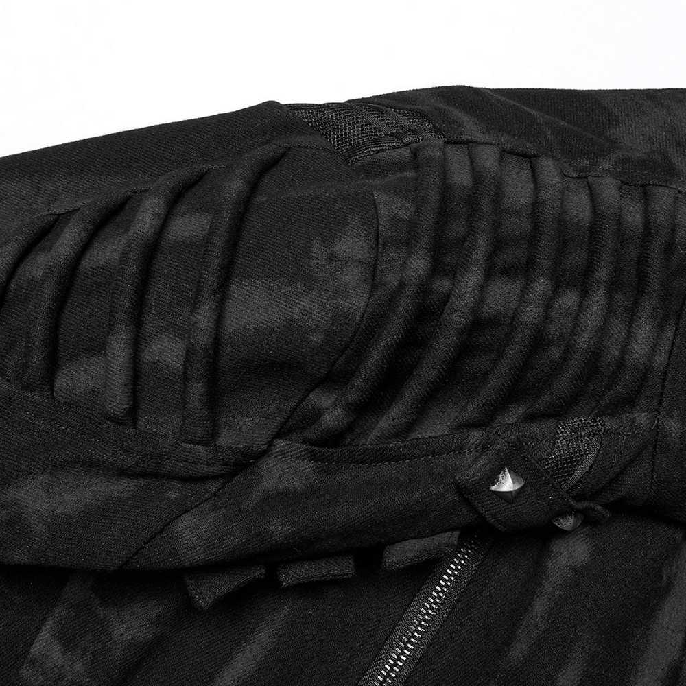 Close-up of the Gothic tie-dye coat showing structured shoulder detail and rivet accents.