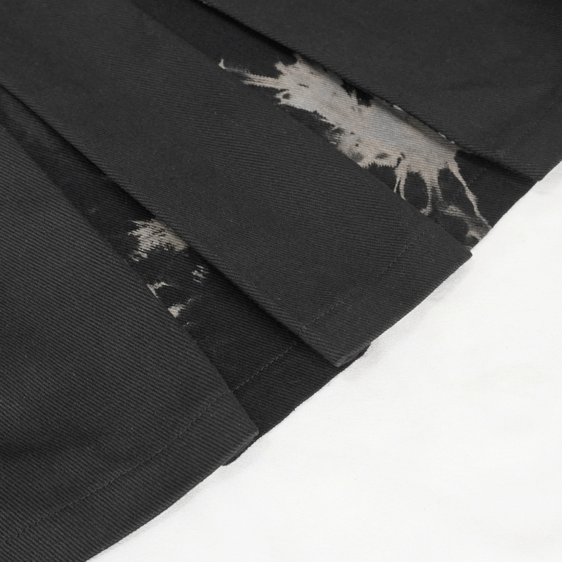 Gothic tie-dyed kilt showcasing detailed pleating and contrasting patterns in a stylish male skirt design.