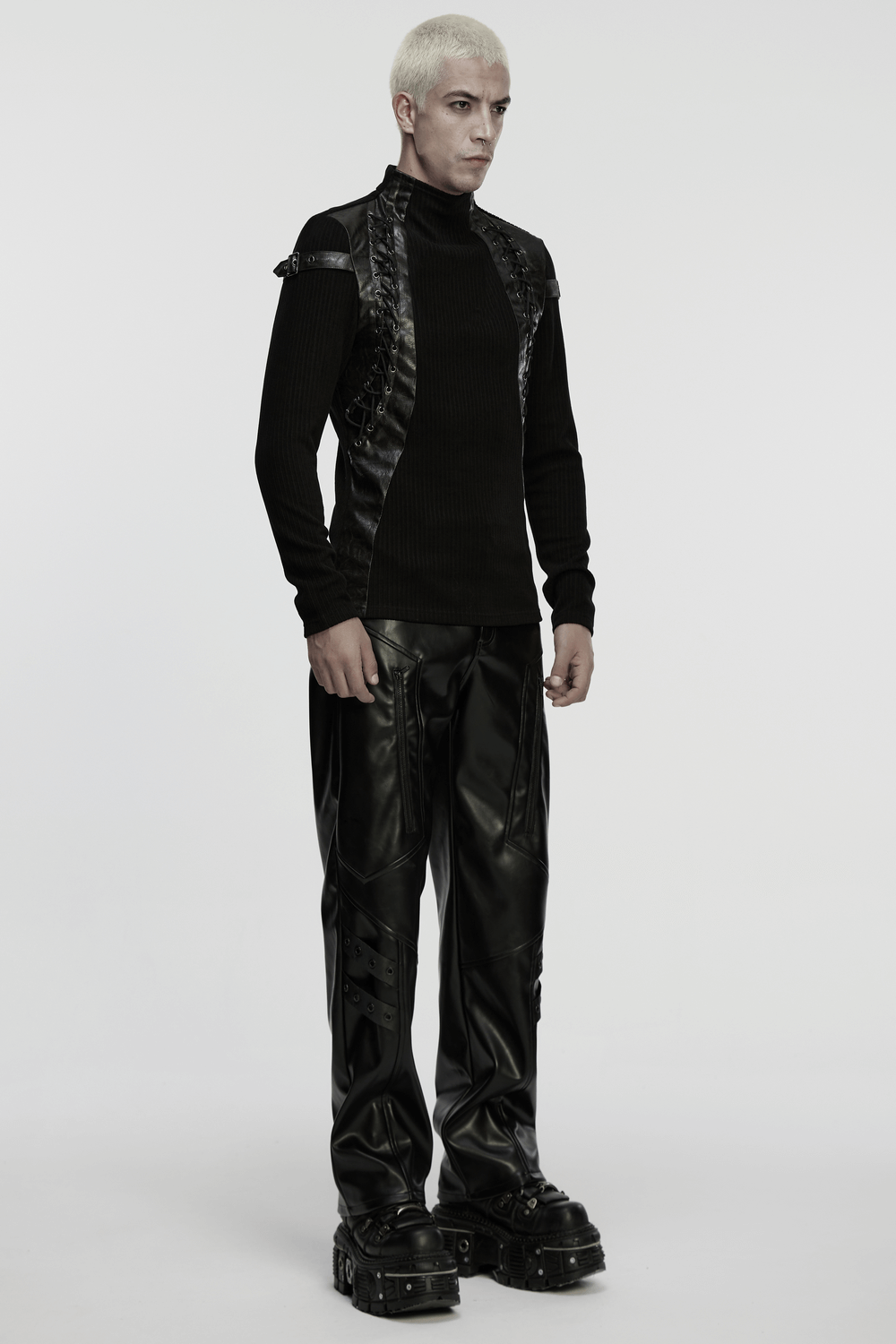 Gothic Top with Leather-Like Panels And Lacing Details styled with edgy black pants for a punk fashion look.