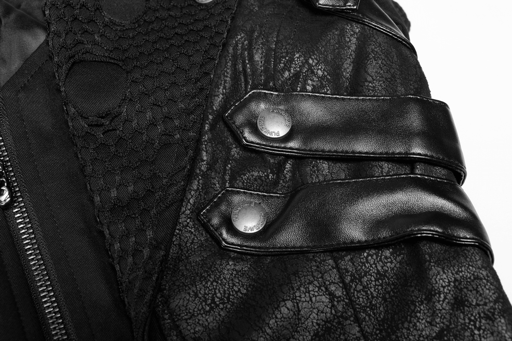 Close-up of gothic trench coat with lacing and zip detail, showcasing black leather texture and metallic accents.
