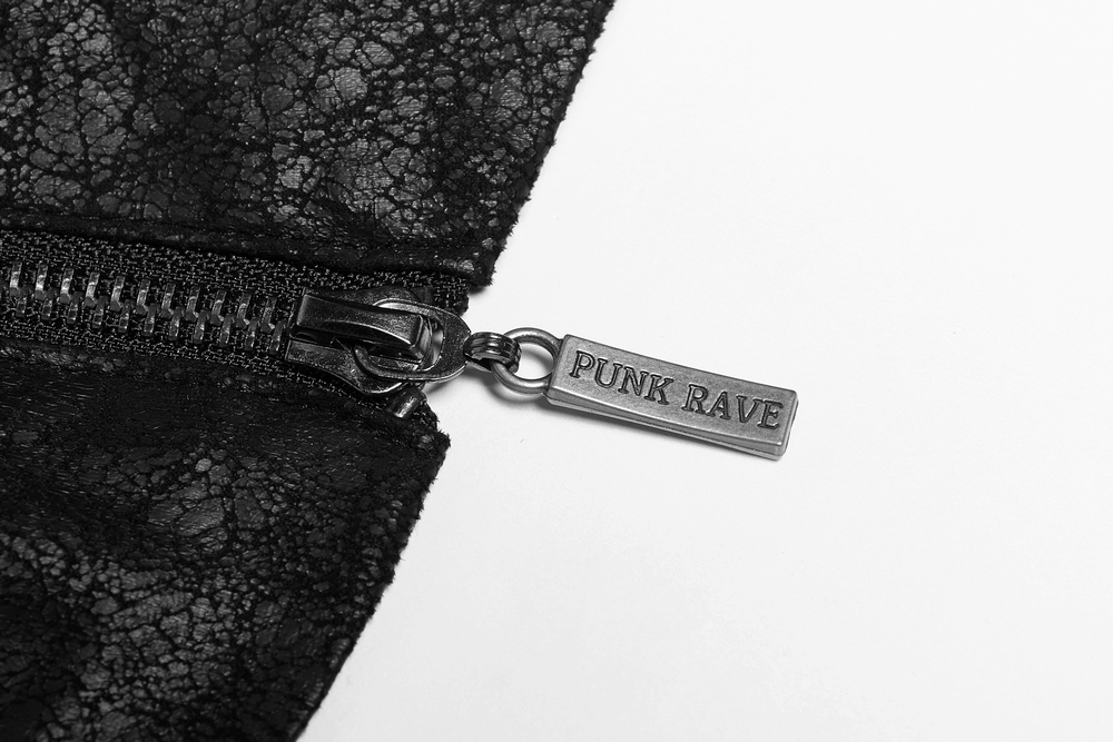 Close-up of a black leather zipper with 'PUNK RAVE' tag on a Gothic trench coat for men.