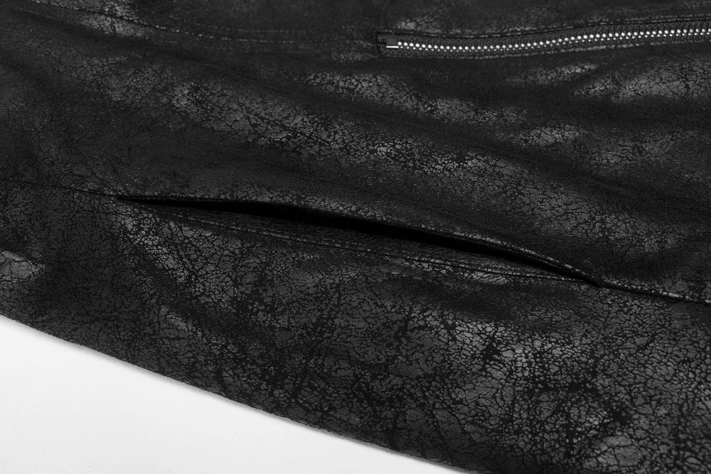 Detailed close-up of men's black leather trench coat showing textured fabric and zipper detail.