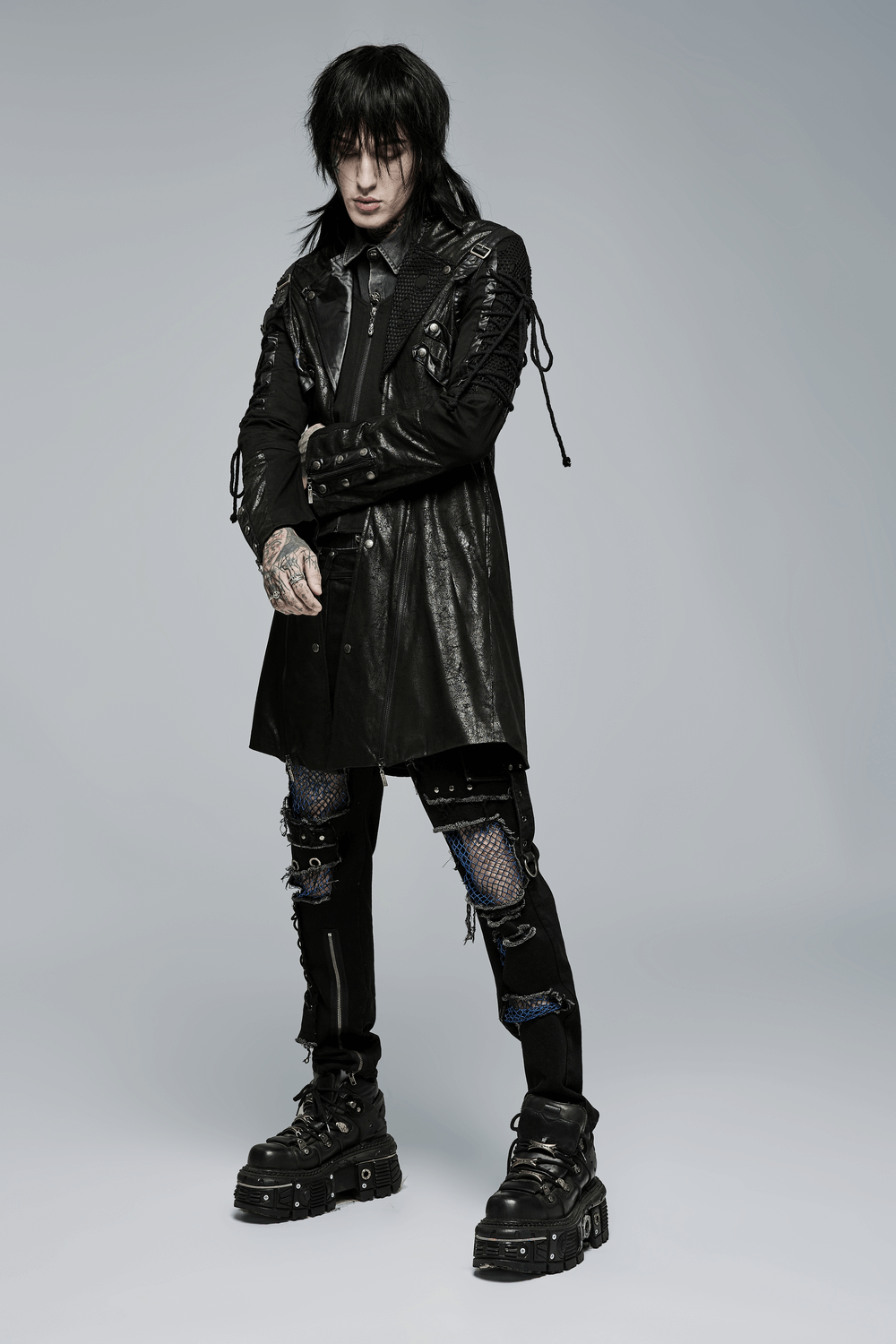 Men's gothic leather trench coat with lacing and zip detail, perfect for an edgy punk rave look.