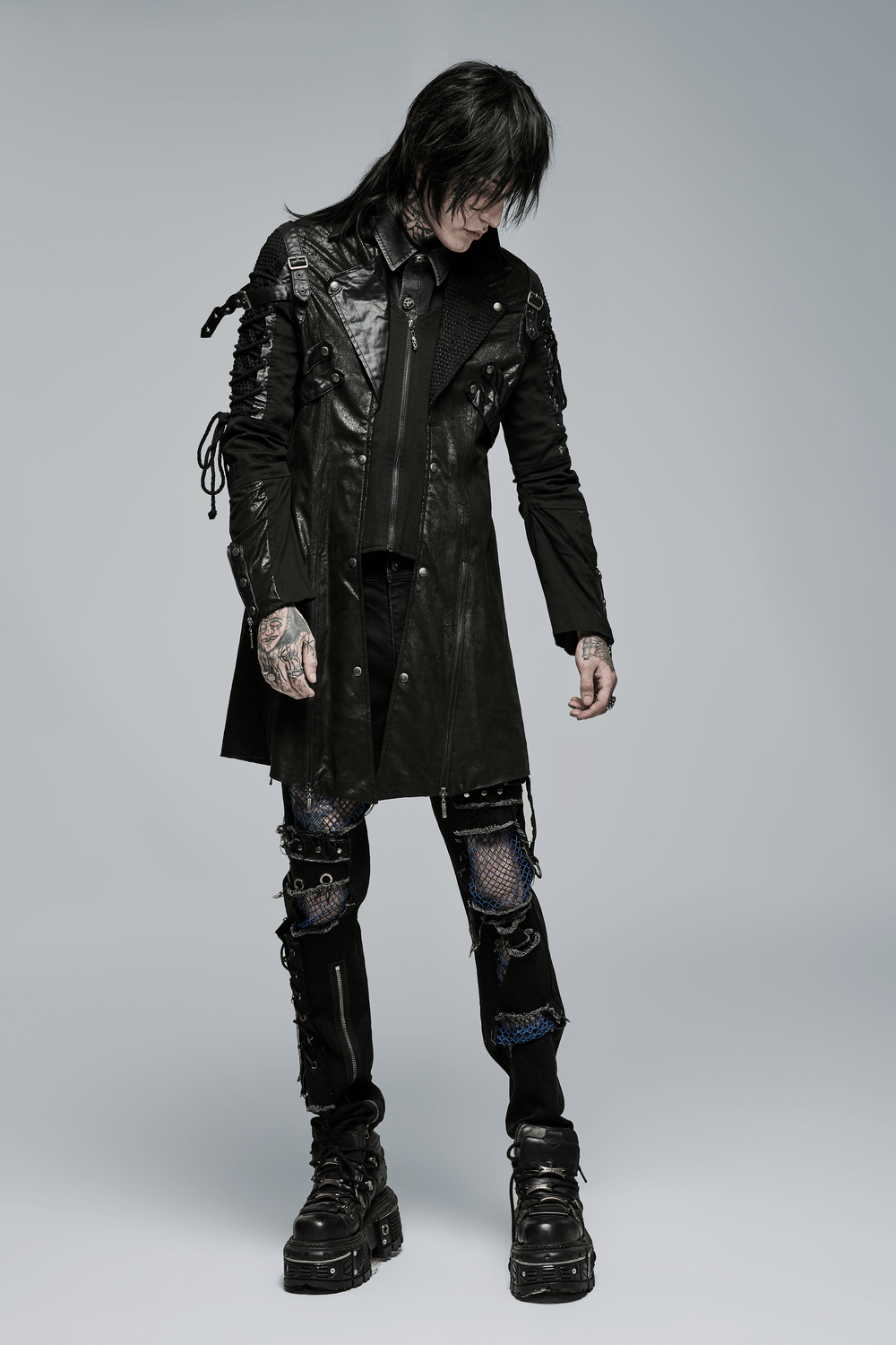 Gothic trench coat with lacing and zip detail for men, showcasing edgy black leather style.