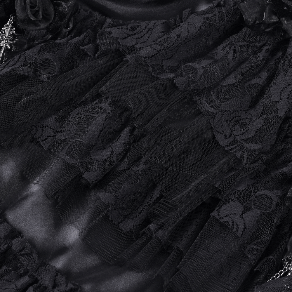 Close-up of a Gothic tulle skirt featuring layered black lace, floral patterns, and elegant textures for alternative fashion.