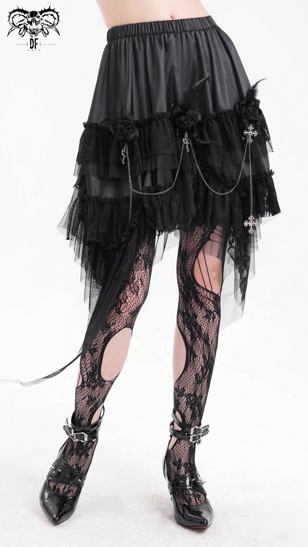 Layered black gothic tulle skirt with lace details and chains, perfect for alternative fashion enthusiasts.
