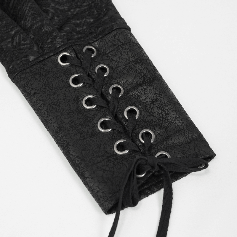 Close-up of lace-up detail on a black gothic long sleeve shirt sleeve, showcasing vintage jacquard fabric.