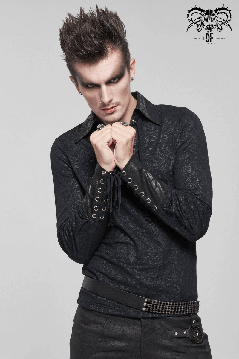 Gothic black shirt with lace-up design, stylish model showcasing vintage goth fashion.