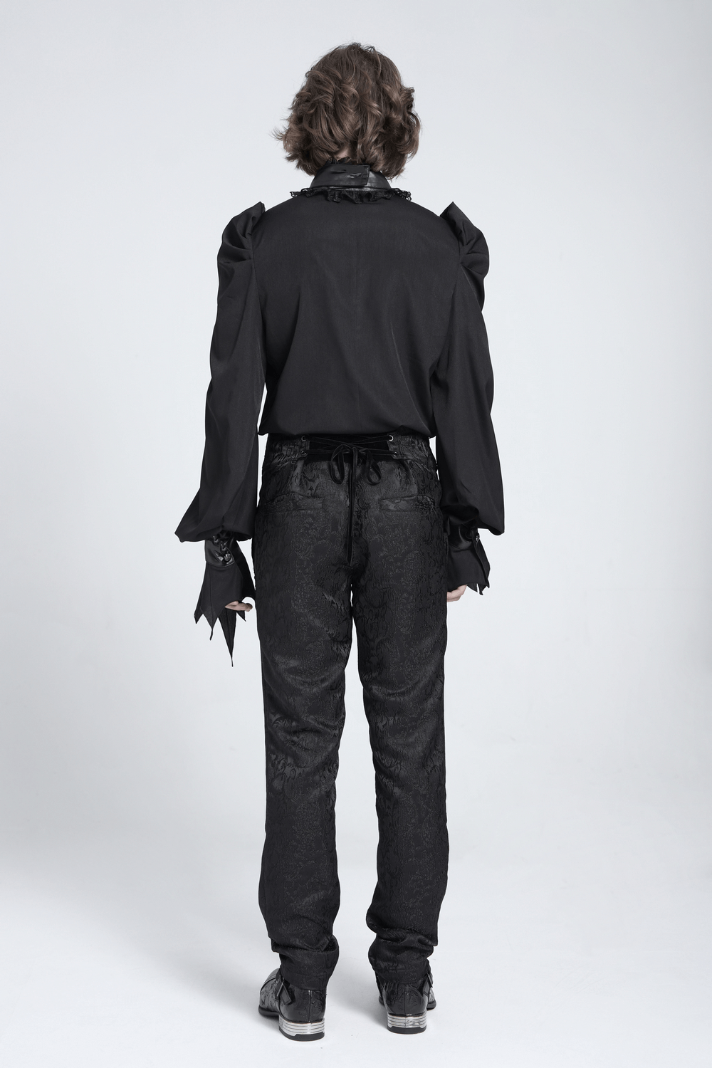 Back view of a Gothic vampire bat wing blouse with lace collar, featuring ruched sleeves and flared cuffs.