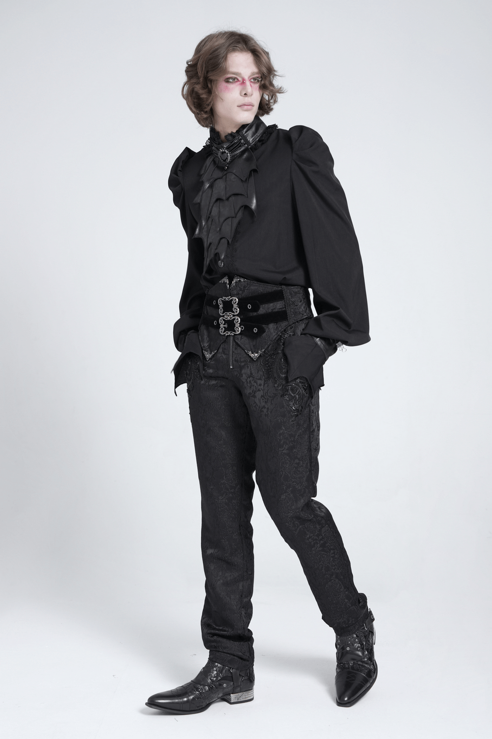 Model showcasing a Gothic vampire bat wing blouse with lace collar, dark romantic vibe, and flared cuffs.