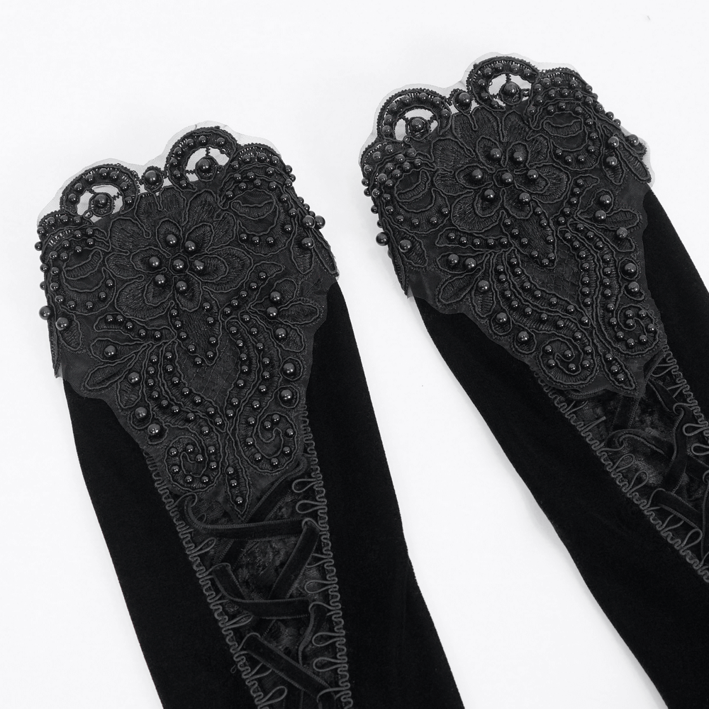 Elegant Gothic velvet and lace gloves with intricate floral patterns, perfect for evening wear.