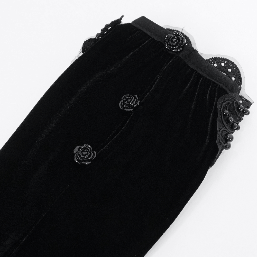 Elegant black velvet gloves with lace detailing and rose accents, perfect for gothic-inspired evening fashion.