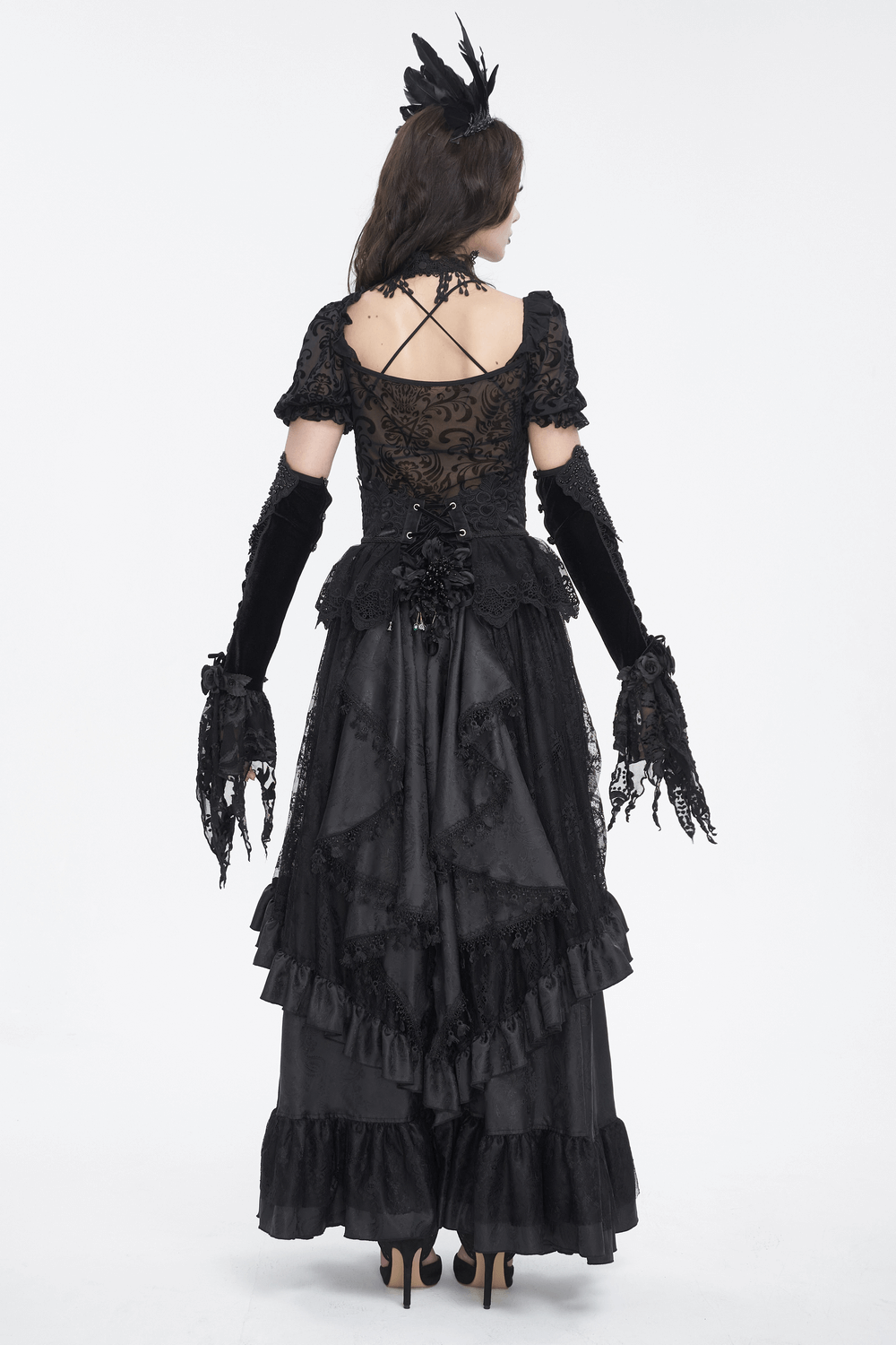 Elegant Gothic lace and velvet evening dress with dramatic detailing, showcasing a sophisticated black design.