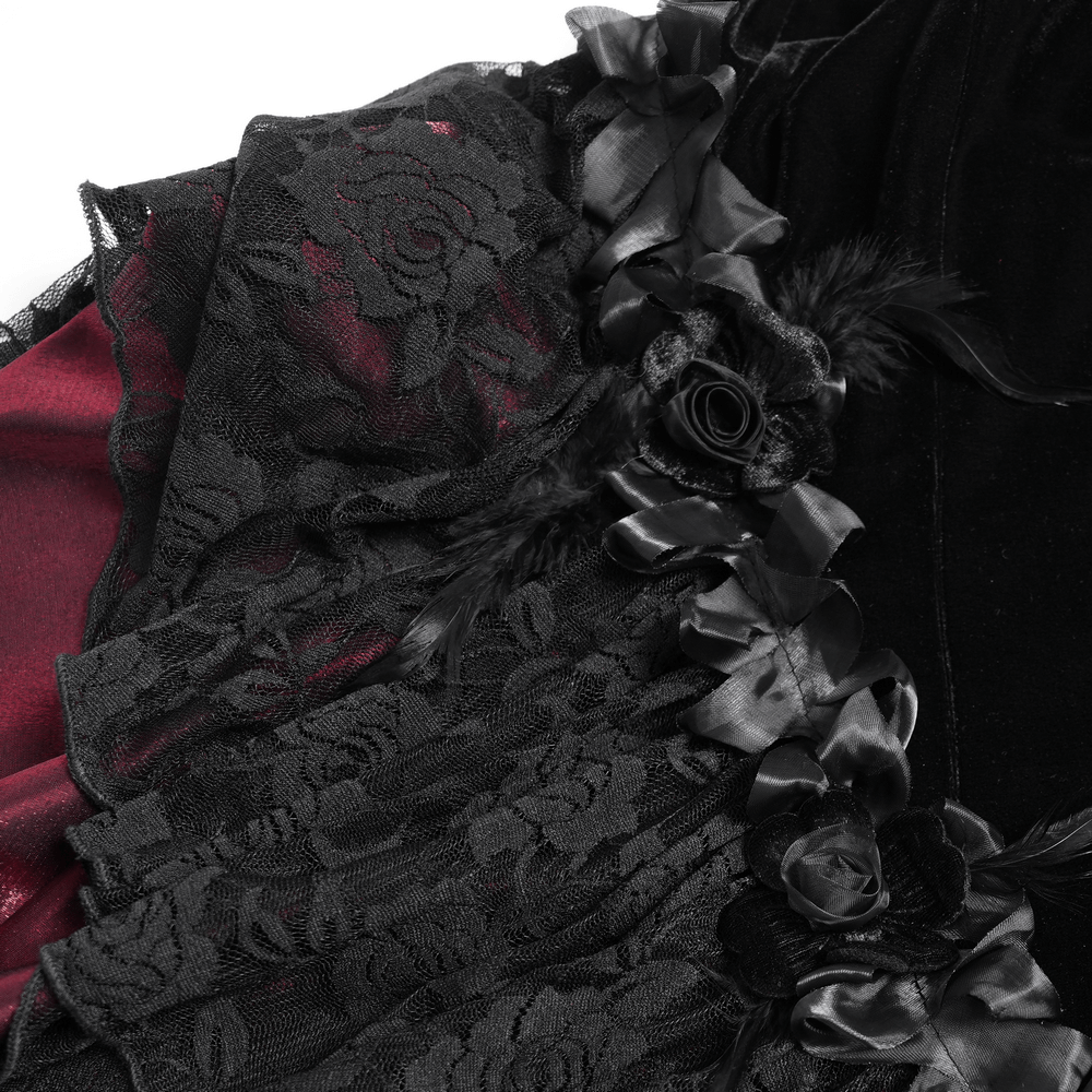 Close-up of gothic velvet dress with black lace, burgundy satin ruffles, and floral rosettes for dramatic elegance.