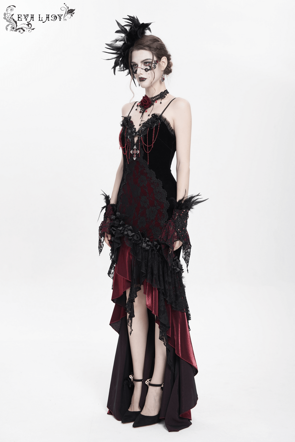Gothic velvet high-low dress with lace, ruffles, and beaded cross pendant, perfect for evening wear or cosplay.