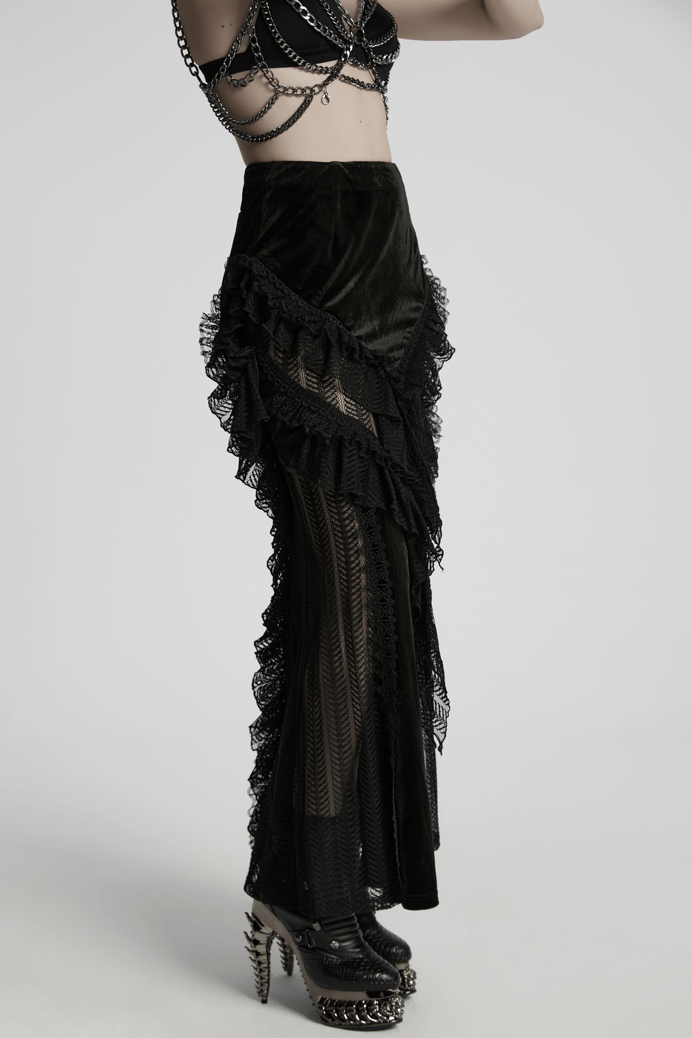 Gothic velvet and lace ruffle skirt with mesh detailing, perfect for a dramatic, edgy look.