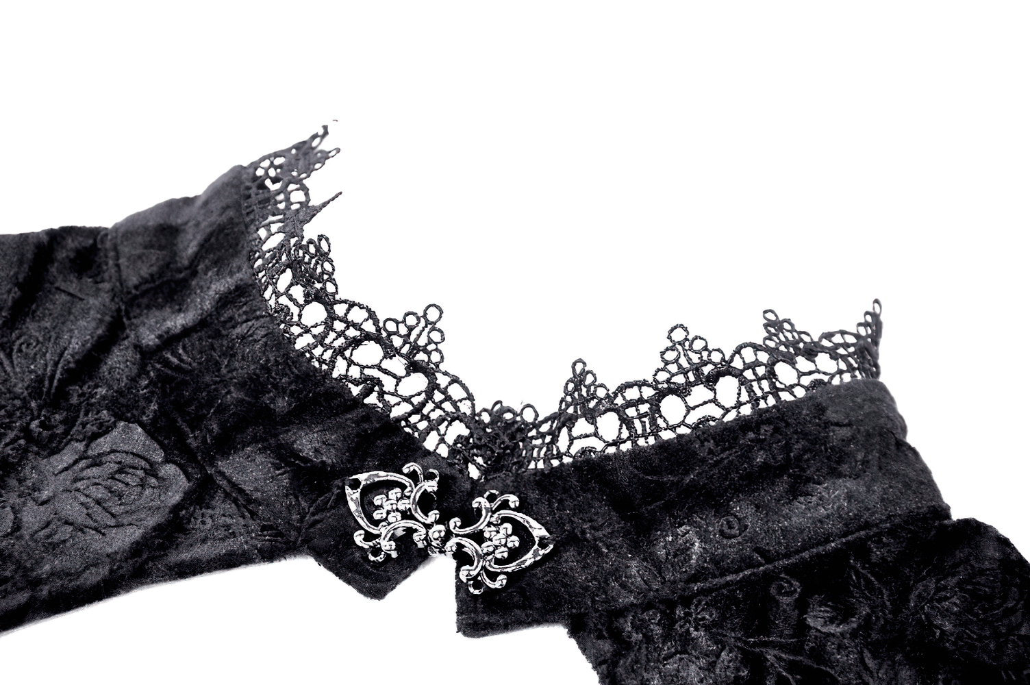 Close-up of black velvet and lace neckline featuring intricate detailing and a decorative clasp. Perfect for Gothic fashion.