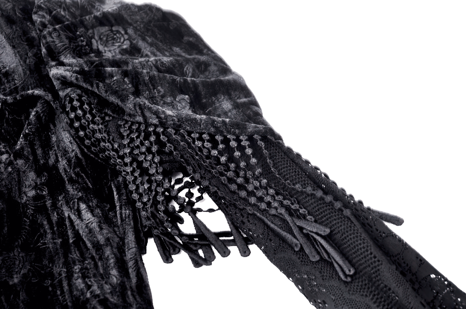 Black velvet top with intricate lace and fringe detailing, showcasing flared sleeves and Victorian-inspired style.