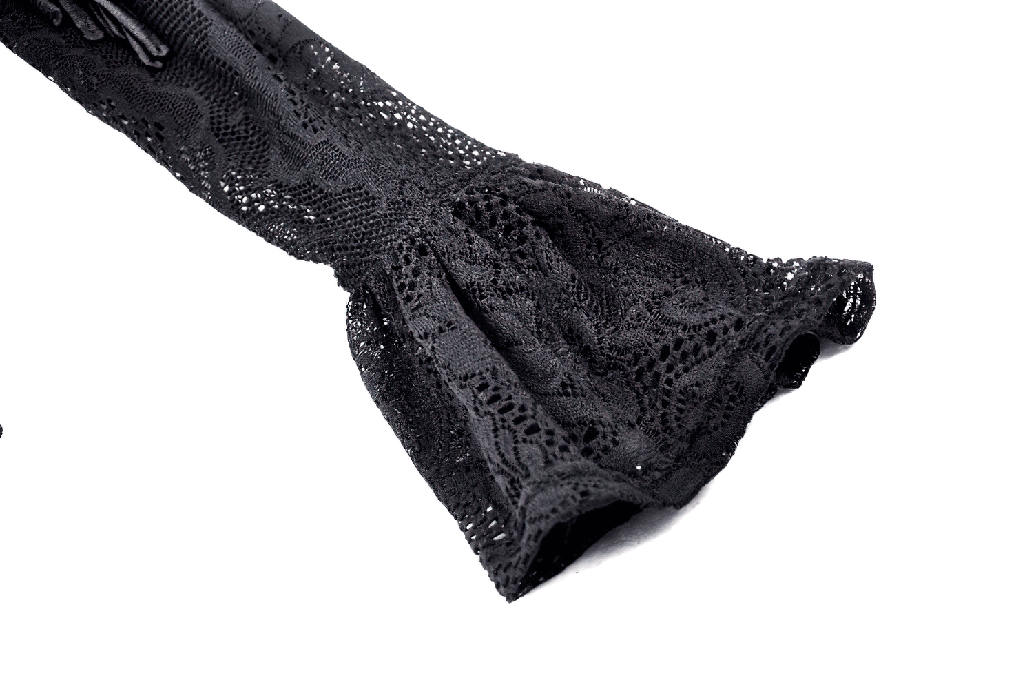 Flared lace sleeve detail of a black Gothic velvet and lace corset top, showcasing intricate designs and textures.