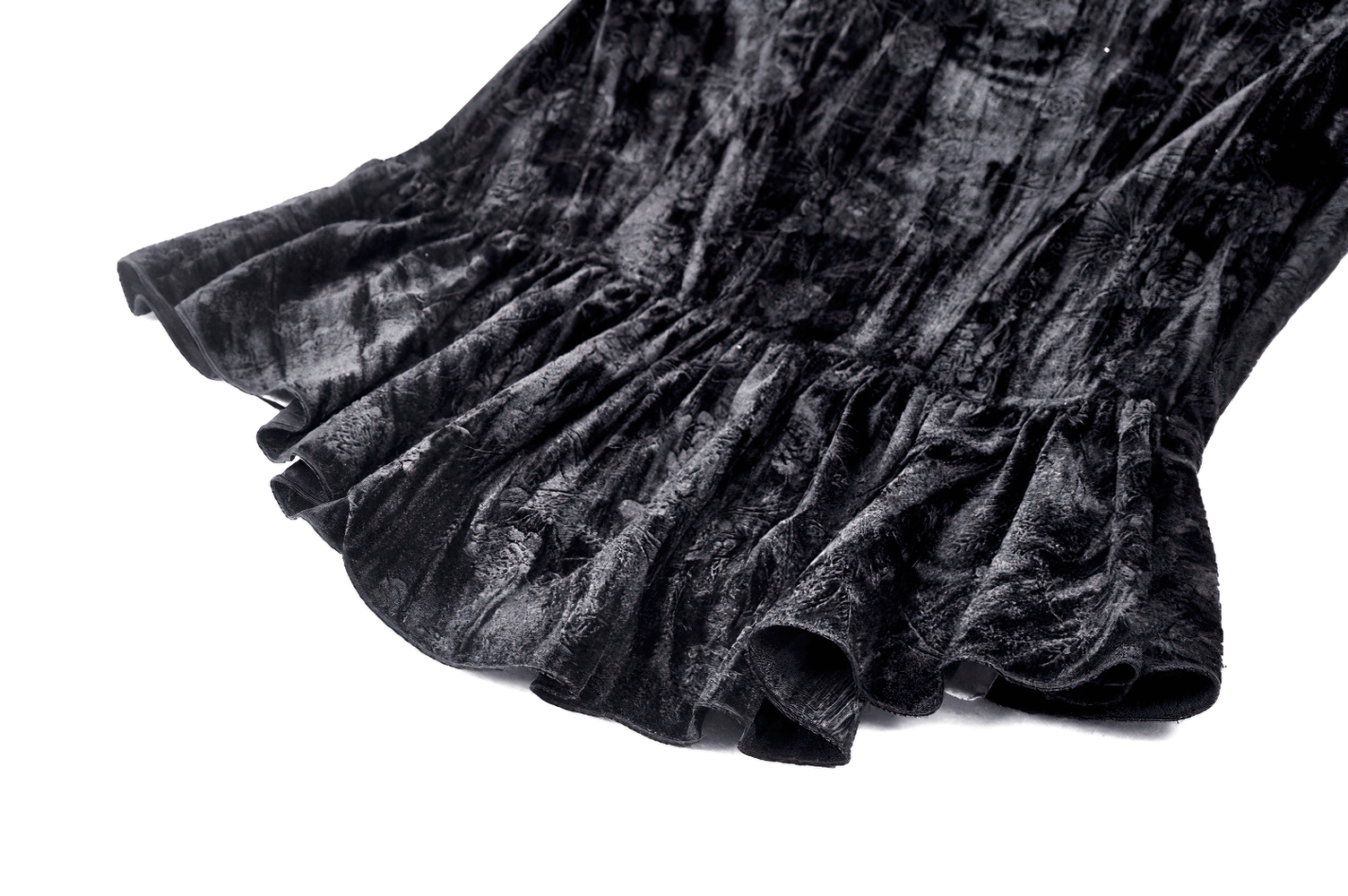 Black velvet fabric with flared ruffle detail, showcasing luxurious texture and elegance perfect for a Gothic-inspired look.