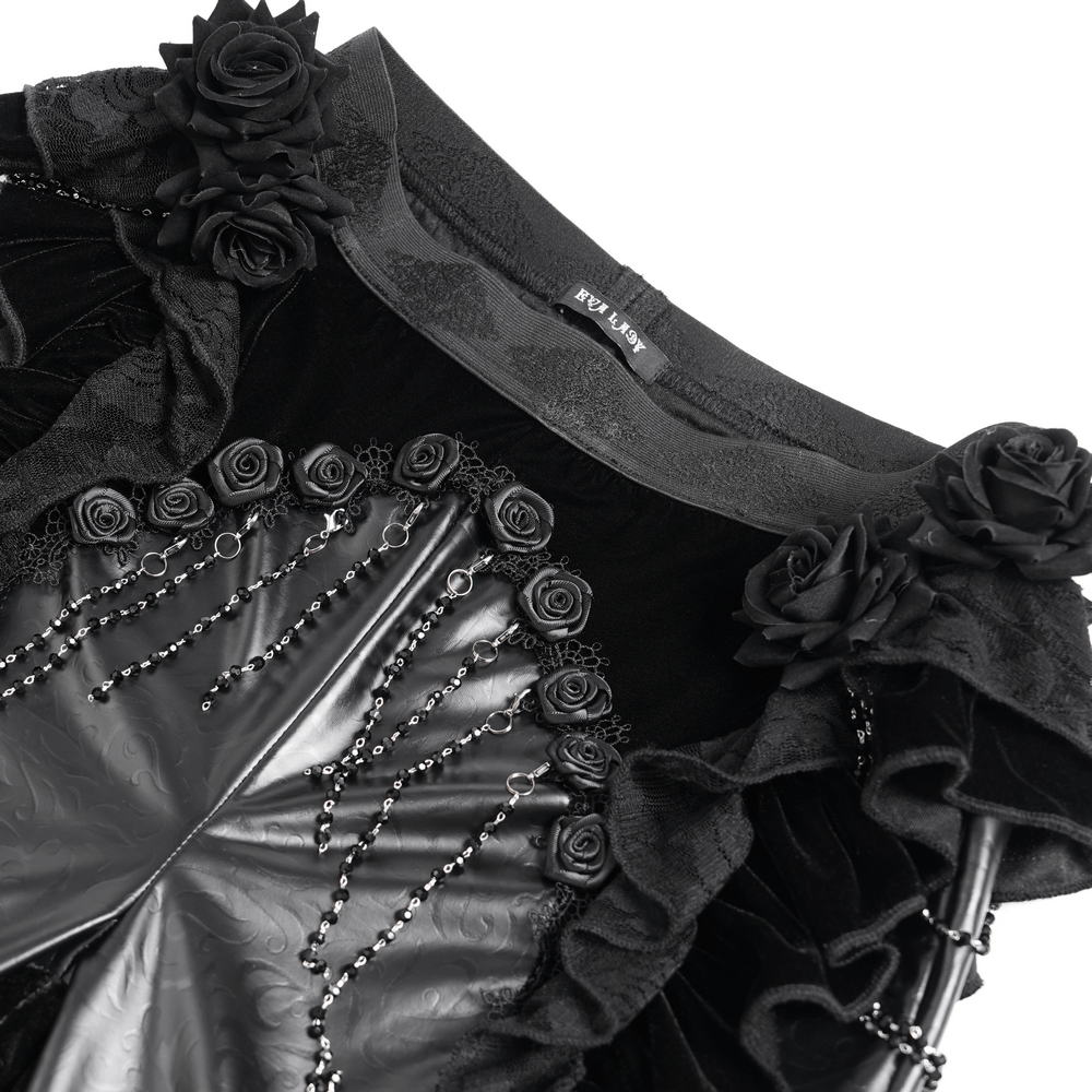 Gothic velvet and leather flare pants with lace ruffles, roses, and beaded chains for dark elegance.