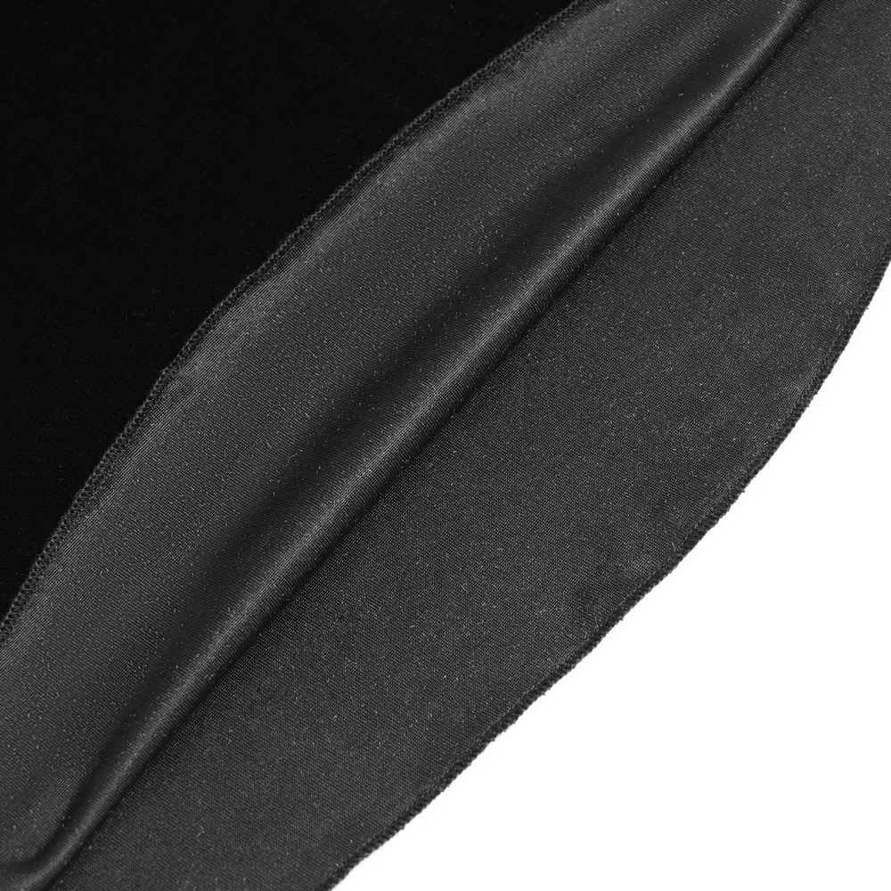 Close-up of soft black velvet fabric showcasing luxurious texture and sleek finish for gothic flare pants.