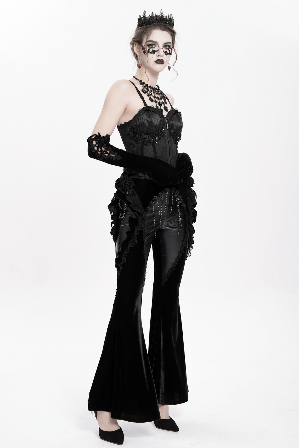 Gothic velvet and leather flare pants with lace ruffles, epitomizing dark elegance and Victorian-inspired fashion.