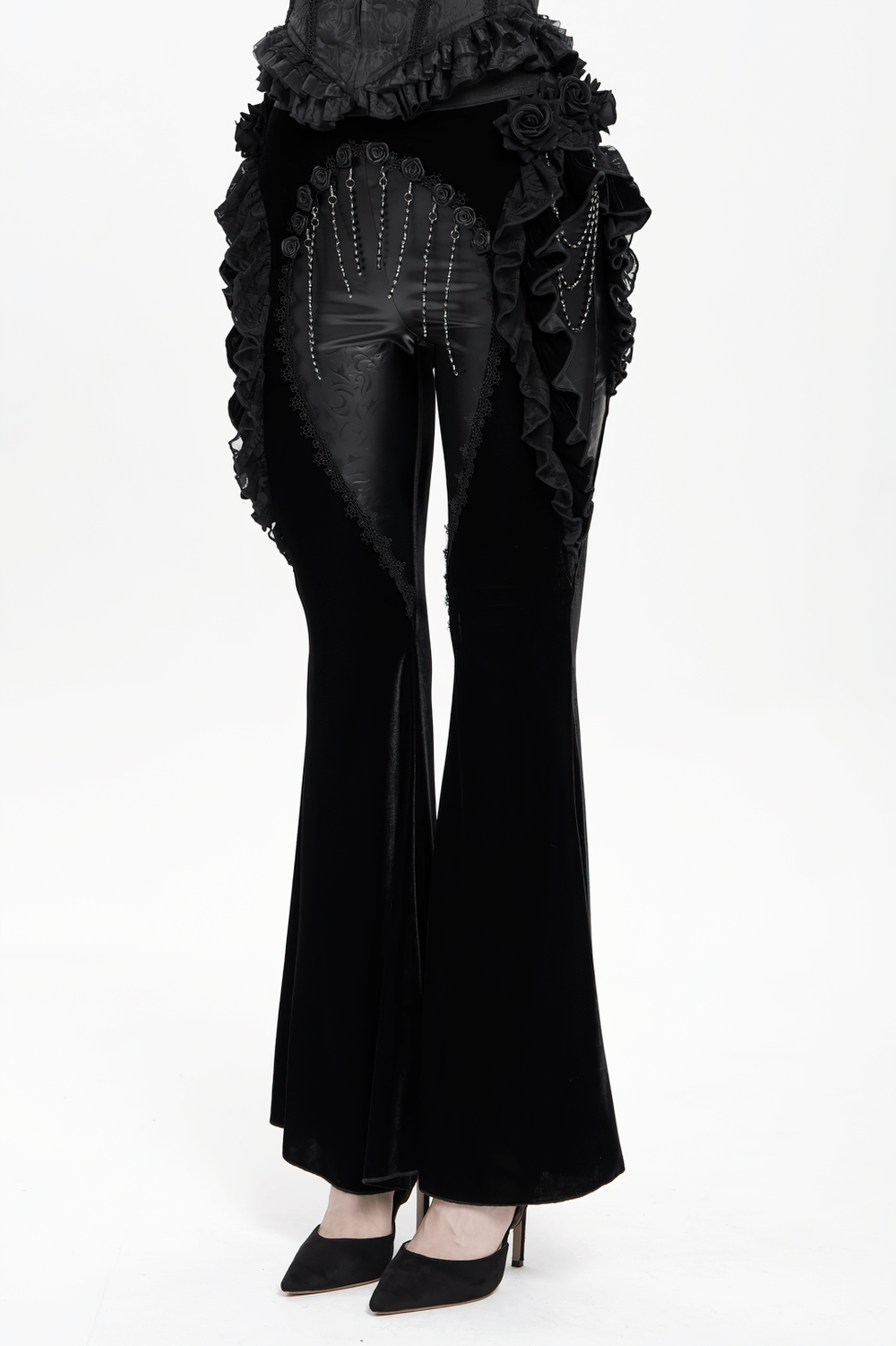 Gothic velvet and leather flare pants with lace ruffles and beaded chains, showcasing dark elegance.