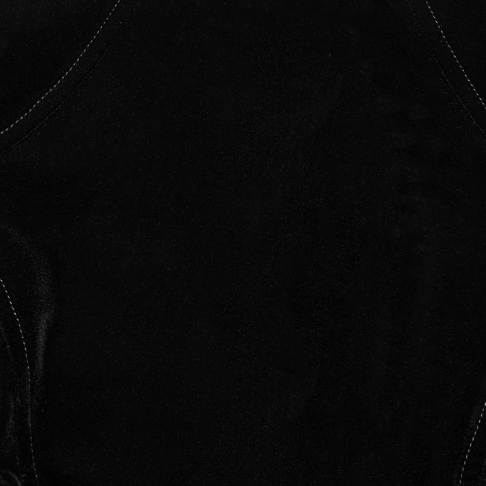 Close-up of luxurious black velvet fabric for Gothic Bat Hem Jacket featuring soft texture and premium quality.