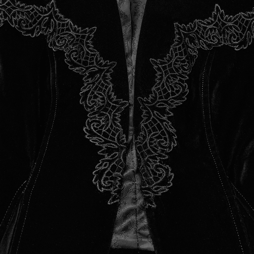 Close-up of Gothic Bat Hem Jacket showcasing decorative lace detailing on deep V-neck and luxurious velvet fabric.