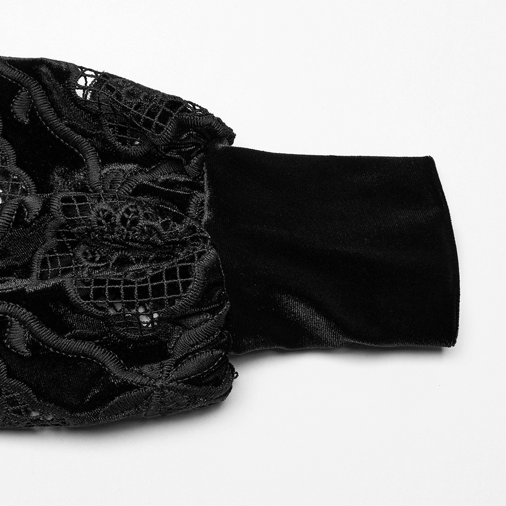 Close-up of the lace and velvet detail on the sleeve of a gothic blouse, showcasing rich texture and design.