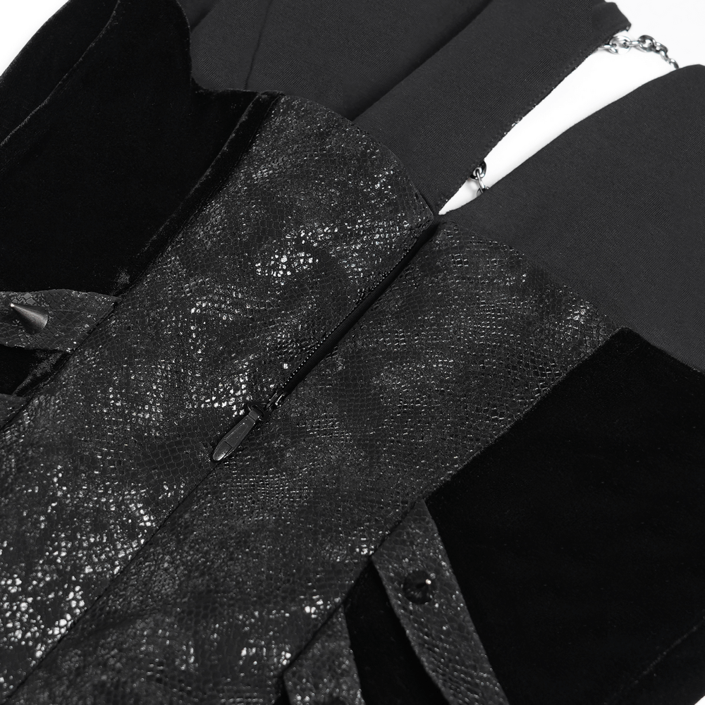 Close-up of the gothic velvet maxi dress showcasing halter neckline and layered chain details.