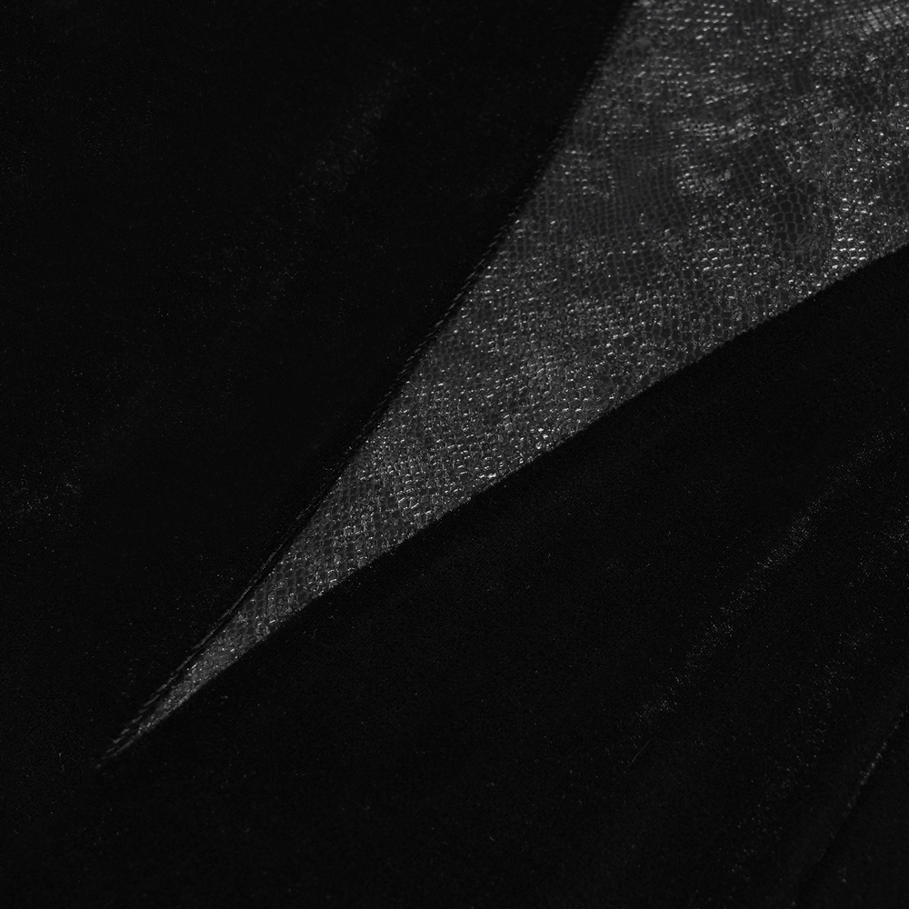 Close-up of luxurious black velvet fabric showcasing its rich texture and sheen, ideal for gothic fashion.