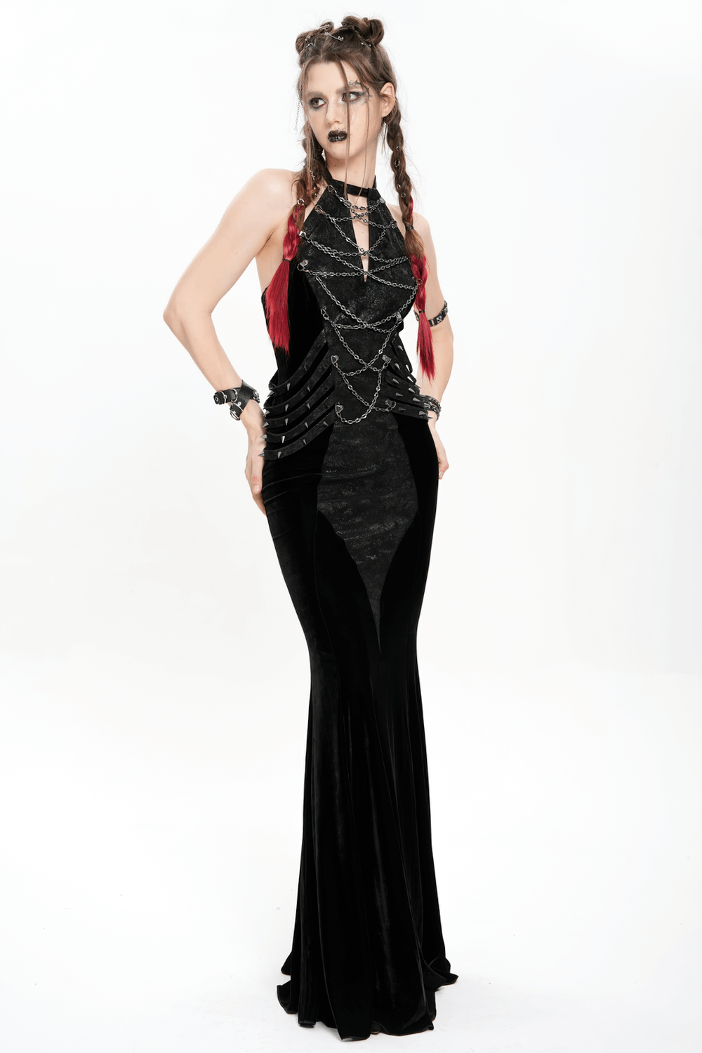 Gothic velvet maxi dress with halter neckline and chain details, perfect for dark alternative evening wear.
