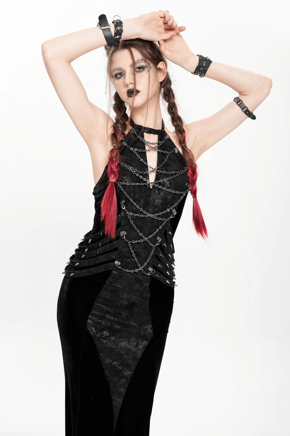 Gothic velvet maxi dress with halter neckline and chain details, perfect for dark alternative fashion events.