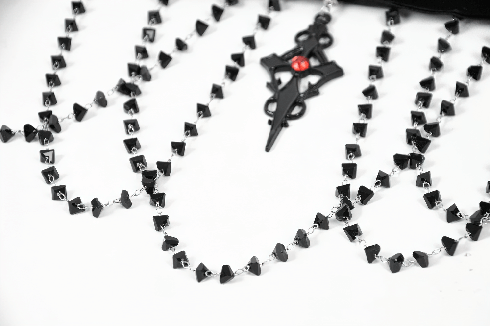 Gothic velvet choker necklace with black lace beads and ornate cross pendant, perfect for alternative fashion.