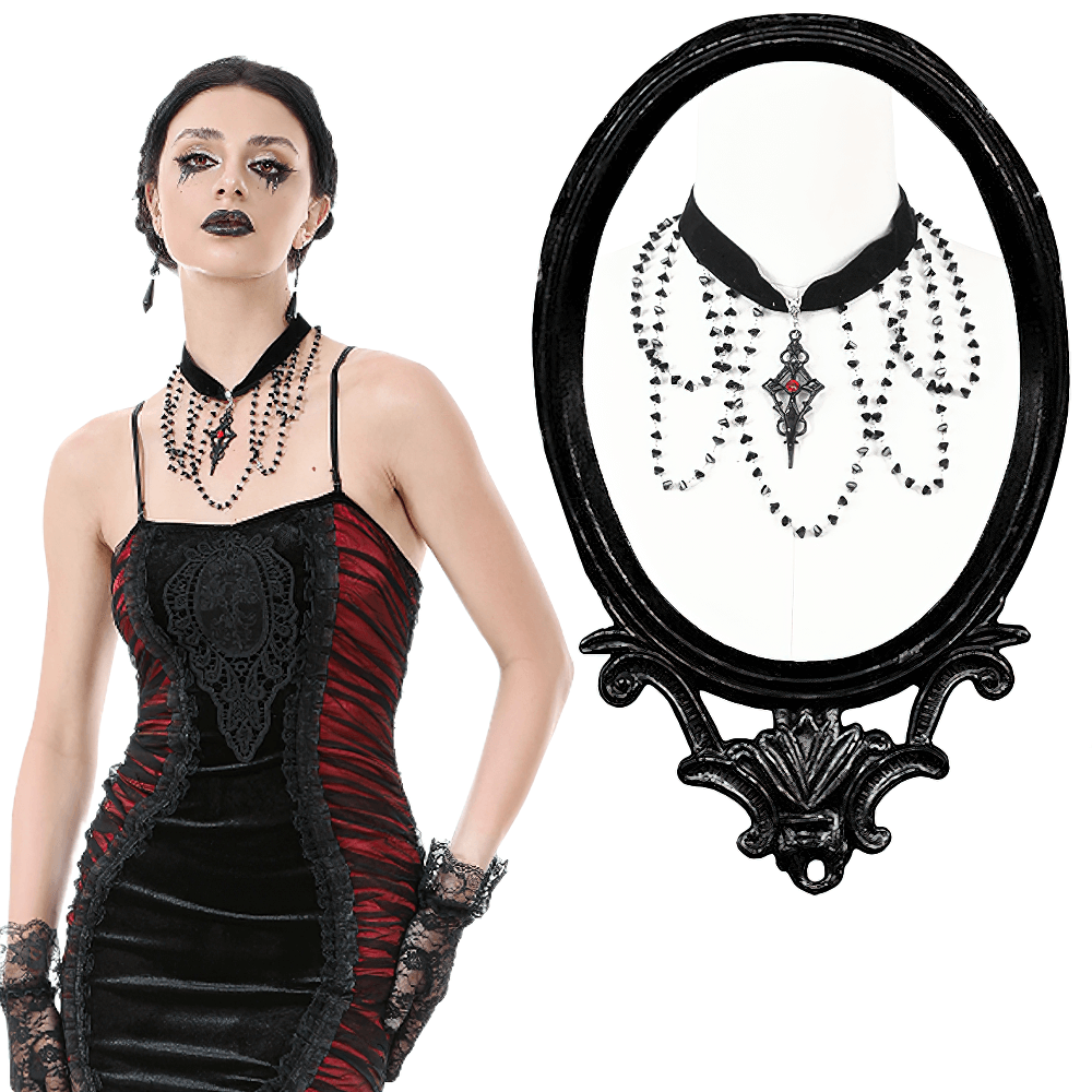 Gothic velvet choker necklace with beaded cross pendant, worn by a model in a striking black and red dress.