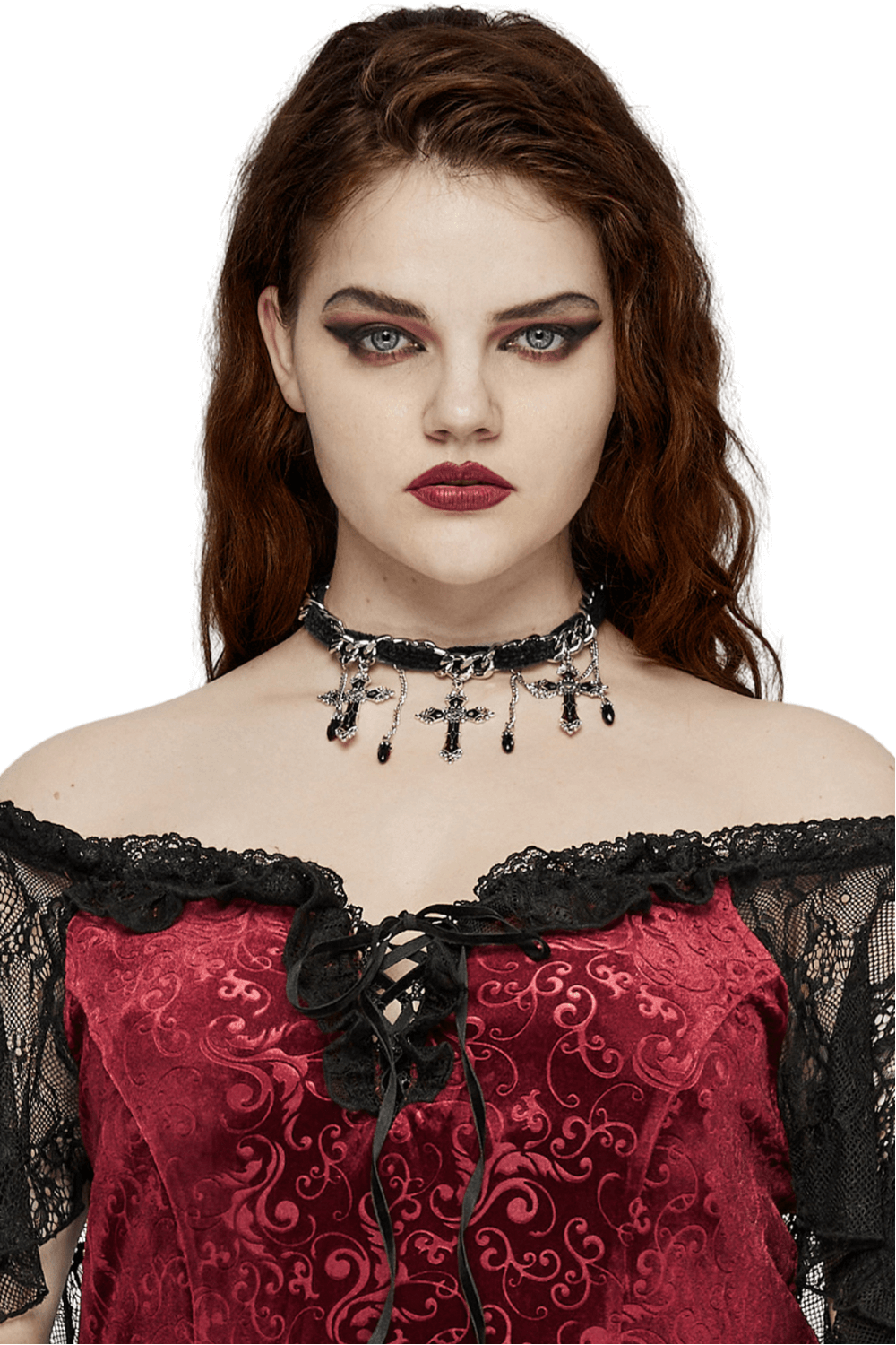 Gothic velvet choker necklace with alloy cross pendants and chain tassels, worn by a model in a red velvet dress.