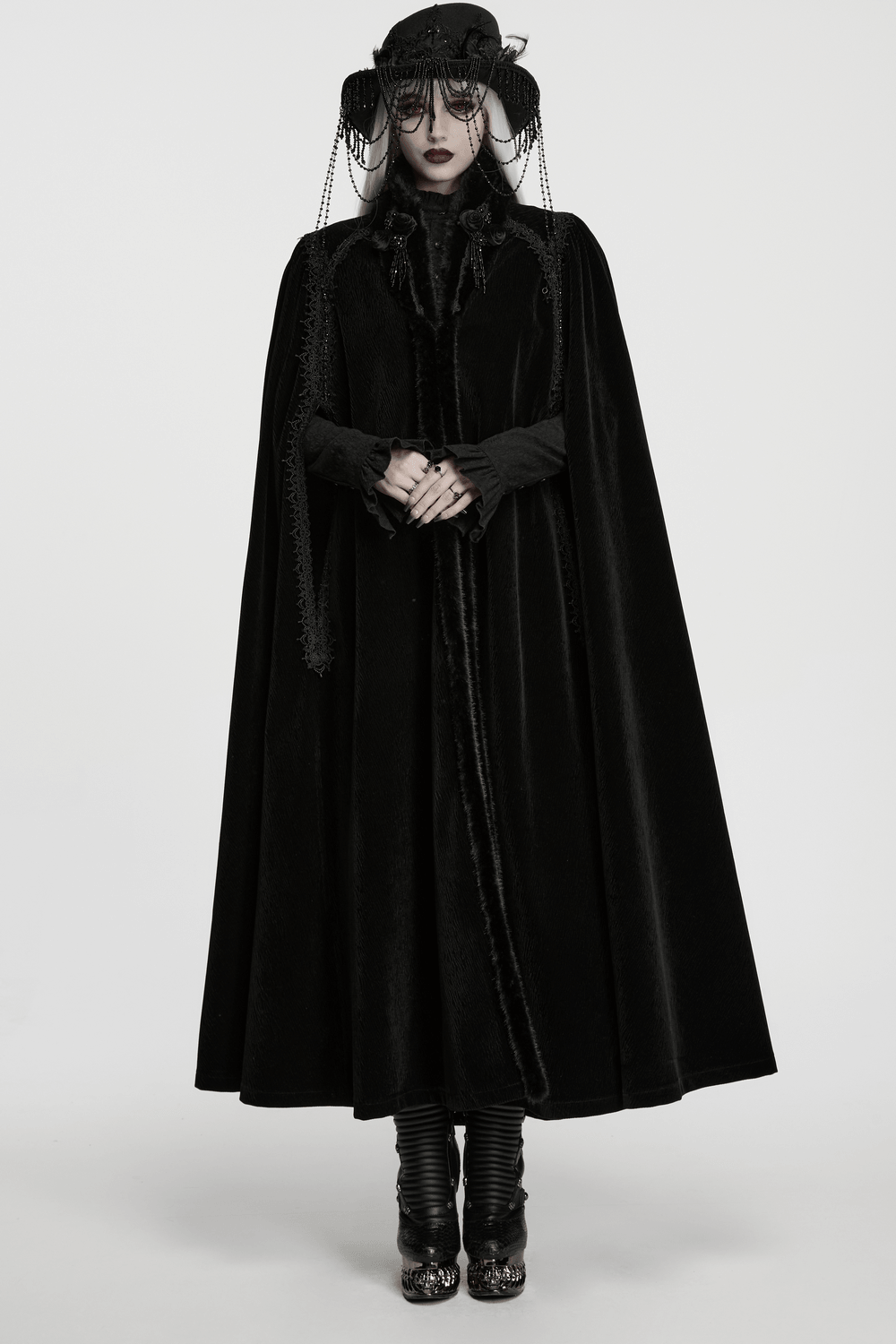 Gothic Velvet Cloak with Wool Collar and Lace Trim worn by a model with dramatic accessories and a striking pose.