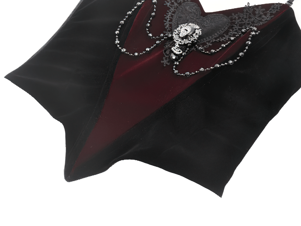 Gothic velvet corset top in black and burgundy with lace and chain details, perfect for alternative fashion.