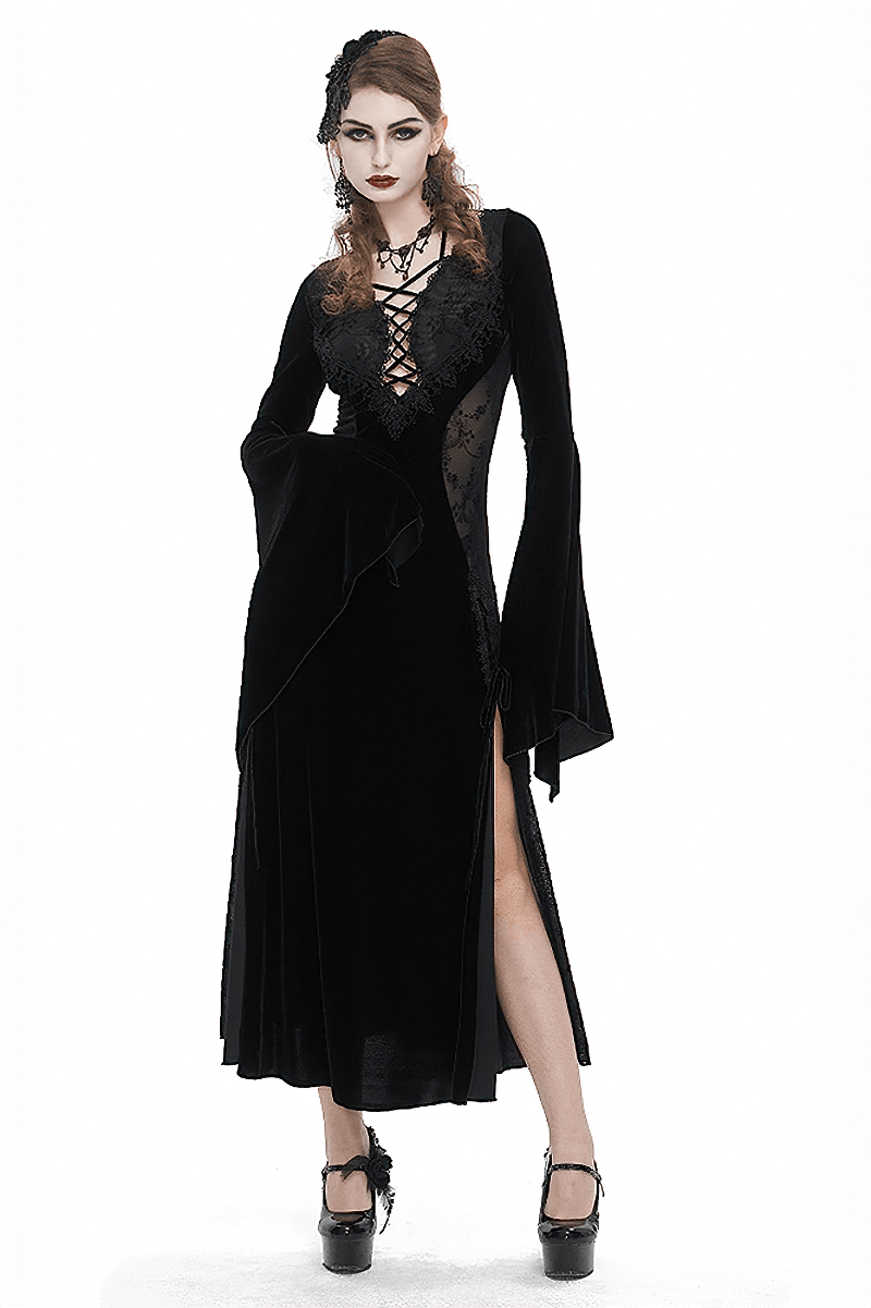 Gothic velvet dress with floral embroidery and flared sleeves, exuding dark elegance and romantic style.