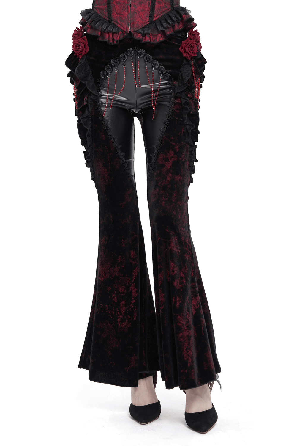 Gothic velvet flare pants featuring rose appliqués and leather panels, perfect for dark romantic styles.