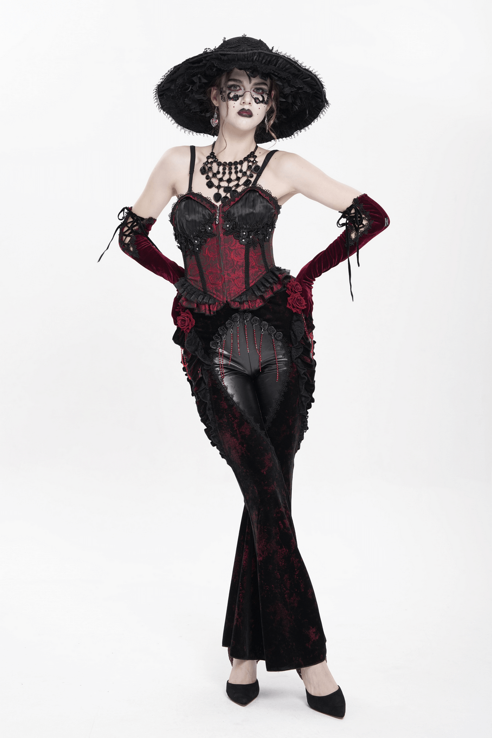 Gothic velvet flare pants adorned with roses, paired with a dramatic corset and accessories for dark romantic fashion.