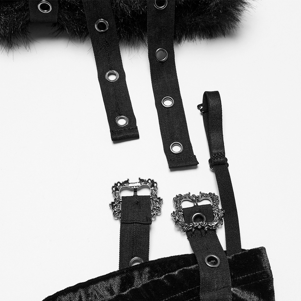 Close-up of gothic velvet skirt straps and buckles with fur trim details, highlighting edgy fashion design.