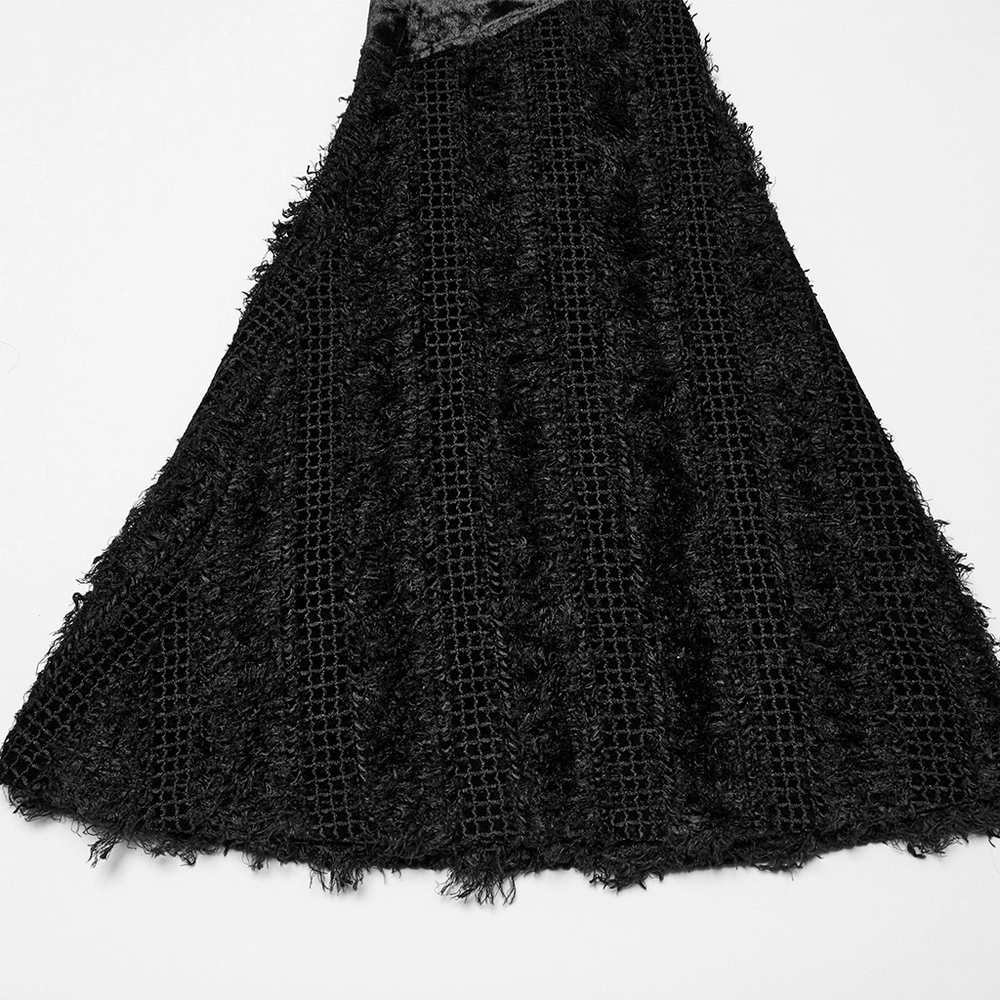 Gothic velvet skirt with textured fur trim, featuring a vibrant black color and stylish layered design.