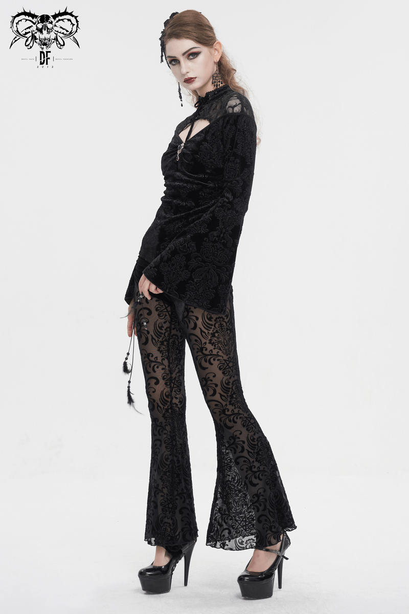 Gothic velvet V-neck top with long bell sleeves and stylish black flared pants for women, exuding dramatic elegance.