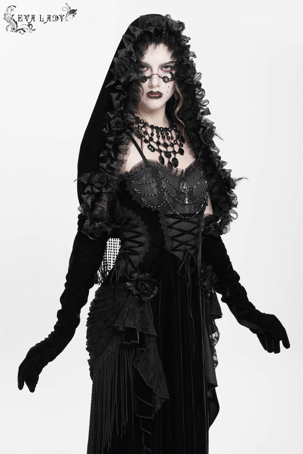 Gothic black velvet hooded cape with floral roses and fringed sleeves, perfect for vintage-inspired elegance.